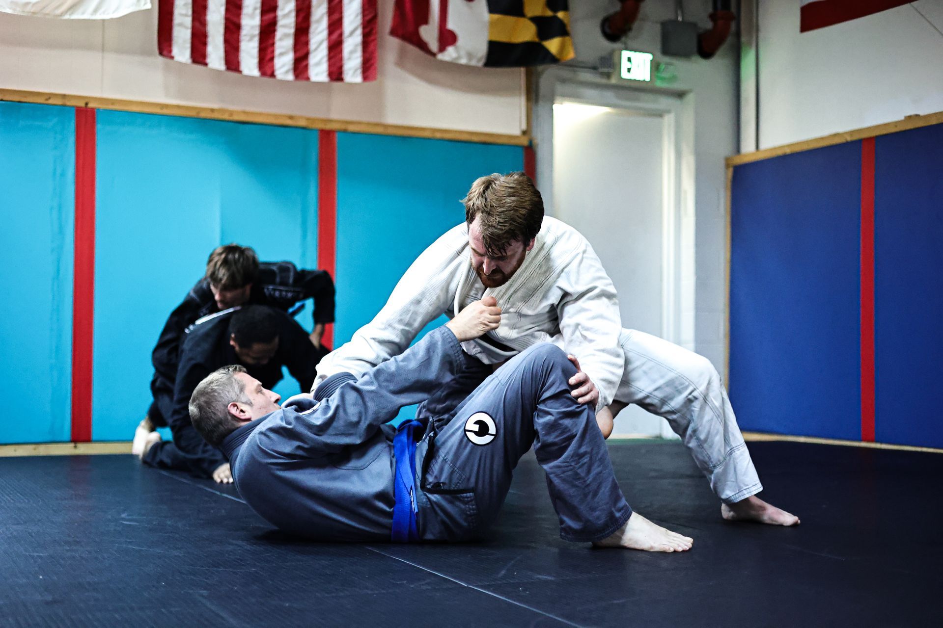 Adults practice Jiu-Jitsu self-defense drills at Infinity Jiu-jitsu and Judo in Timonium, MD for confidence