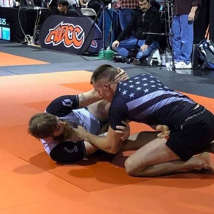 Adults practicing Jiu-Jitsu drills at Infinity Jiu-jitsu and Judo in Timonium, MD to build focus and agility.