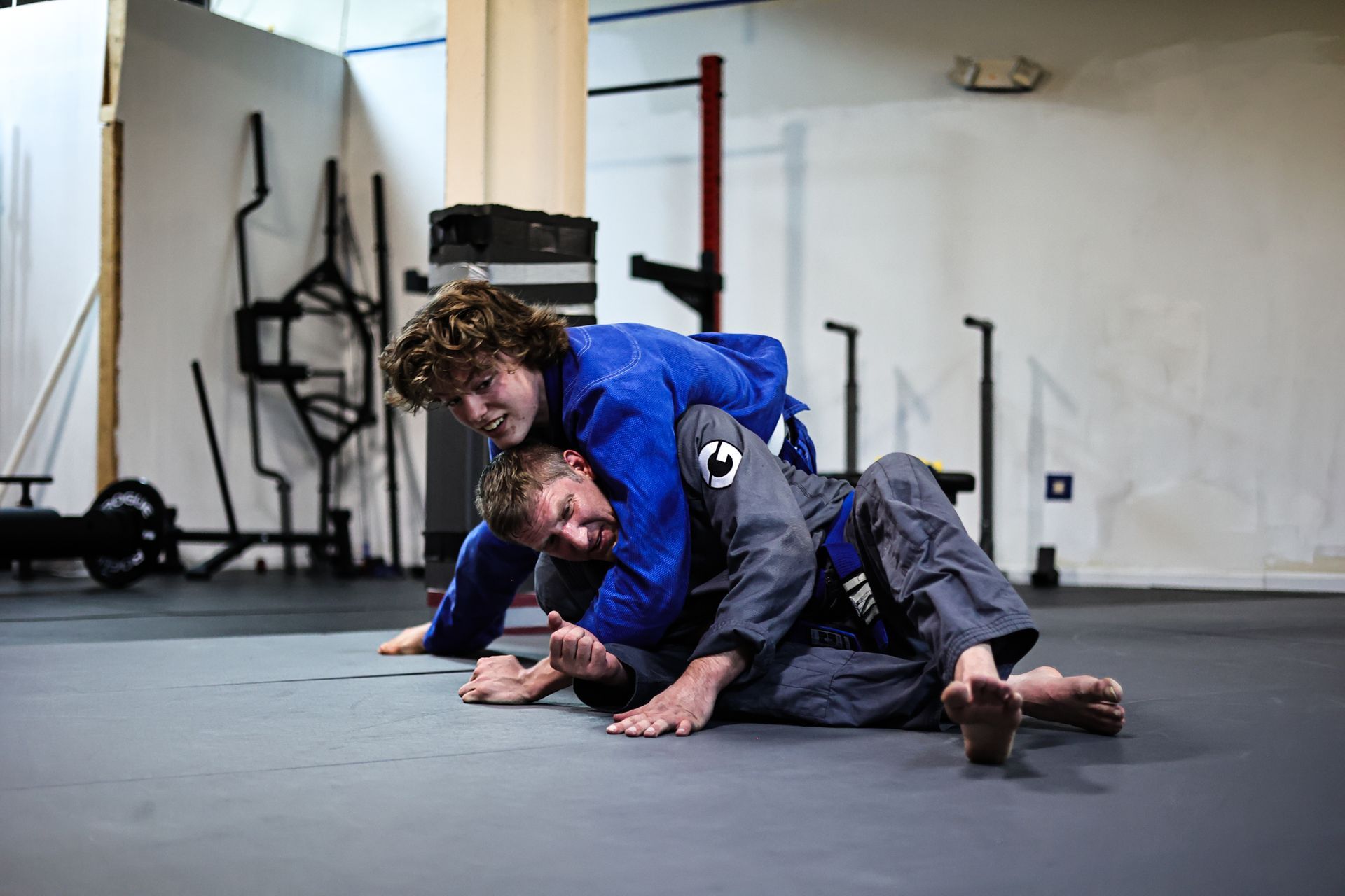 Family partners drilling Jiu-Jitsu at Infinity Jiu-jitsu and Judo in Timonium, MD, building confidence together.