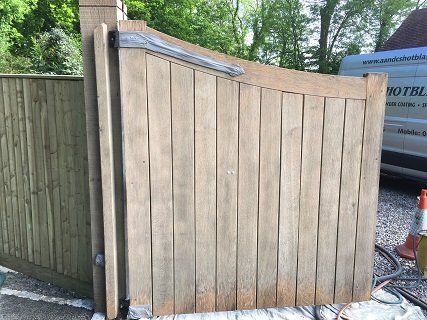 Grit blasted wooden gate