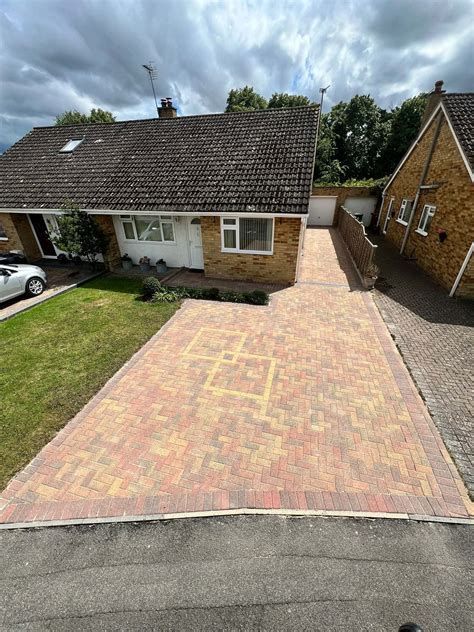 A brick house with a blue door and white trim