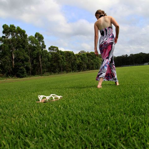 Lady on Green Grass — Sydney NSW — Aussie Turf & Soil