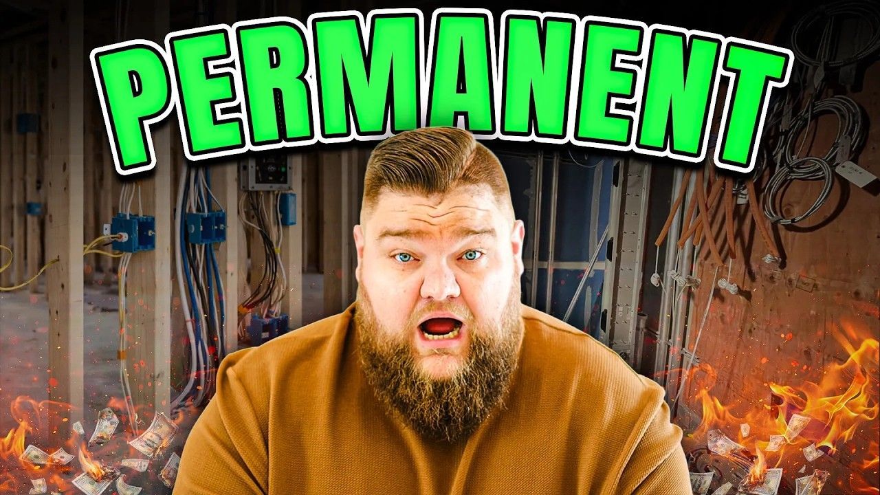 A bearded person looks surprised in front of a room under construction with flames at the bottom and text reading PERMANENT.