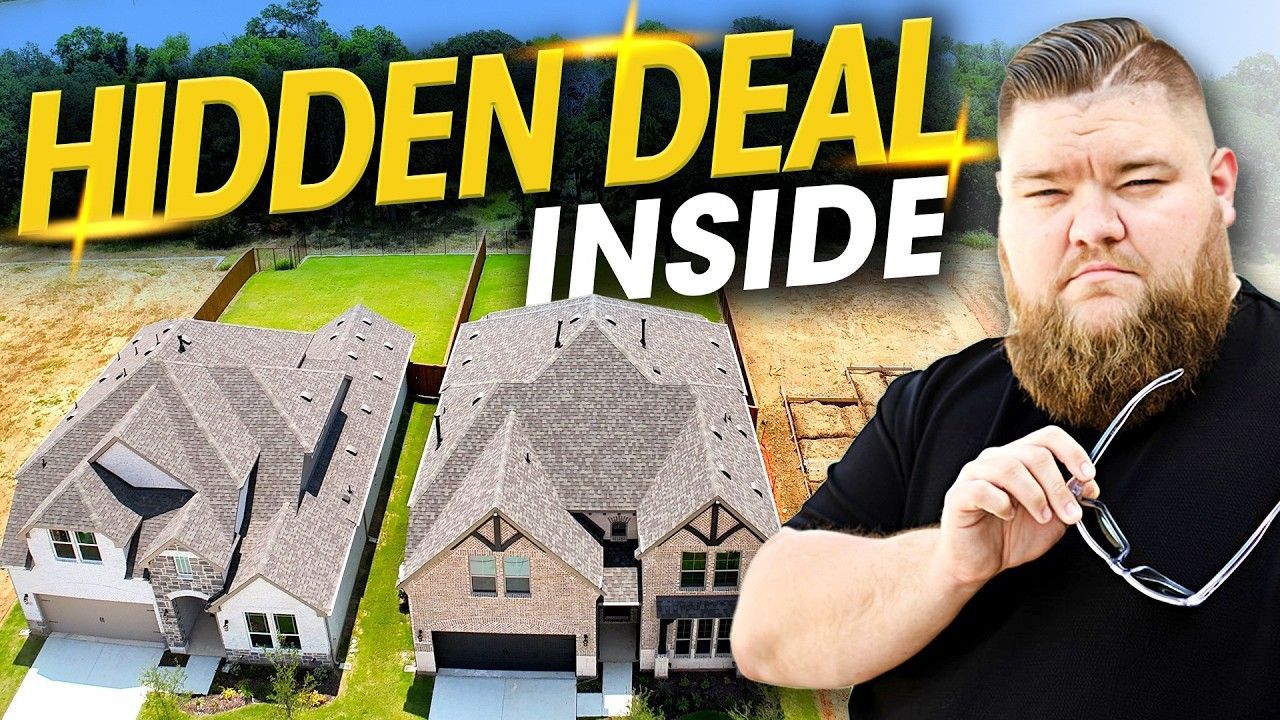 A man with a beard is holding glasses in front of a house that says hidden deal inside.