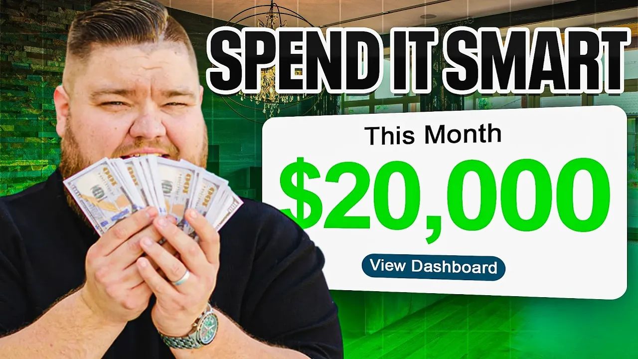 A man is holding a bunch of money in his hands.