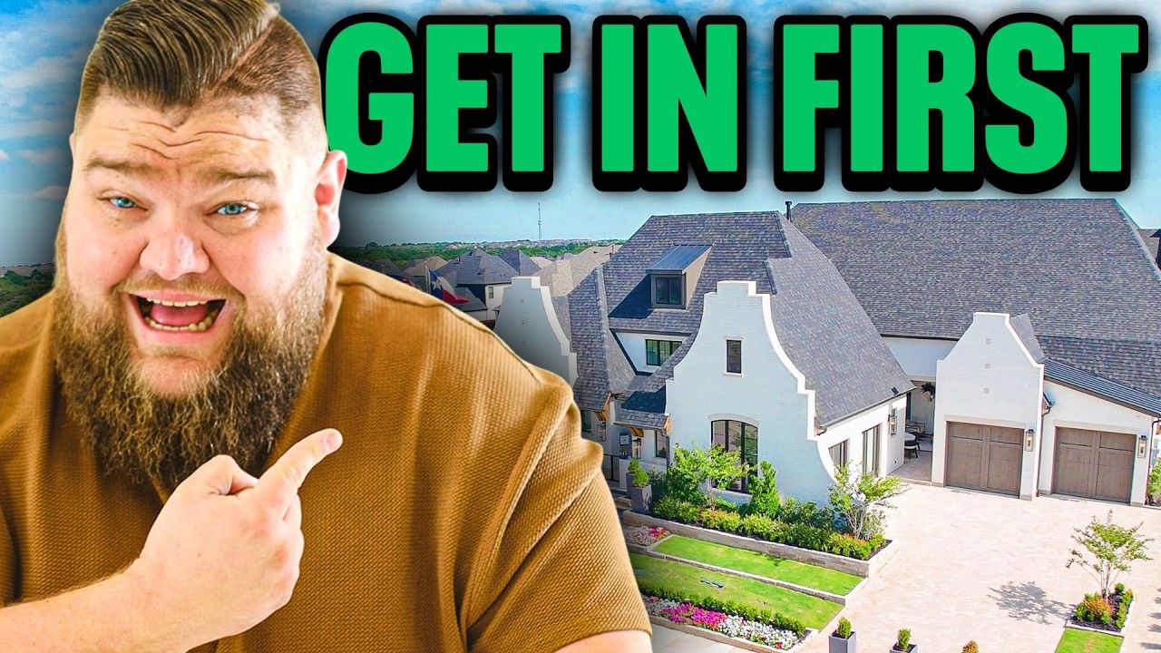 A man with a beard is pointing at a house in the background.