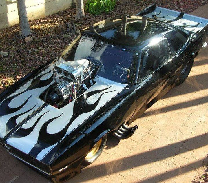 Black Hot Rod With Silver Flames on the Hood, Exposed Engine — Banjo's Anytime Towing in Humpty Doo, NT