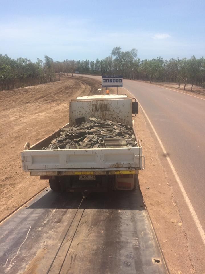 Truck Bed Loaded With Dark Materials — Banjo's Anytime Towing in Darwin, NT