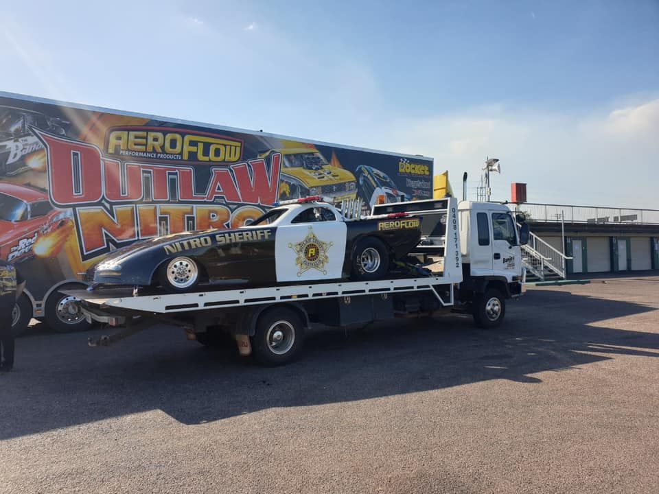 A Race Car Painted as a Police Car — Banjo's Anytime Towing in Humpty Doo, NT