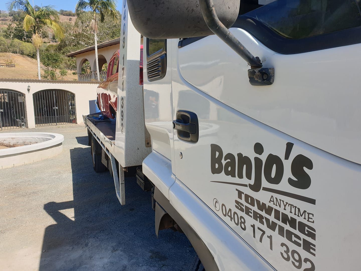 White Tow Truck Parked, With Banjo's Text Written — Banjo's Anytime Towing in Humpty Doo, NT