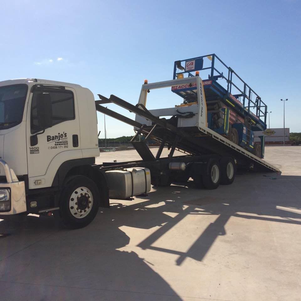 White Truck Towing a Trailer With a Blue — Banjo's Anytime Towing in Humpty Doo, NT