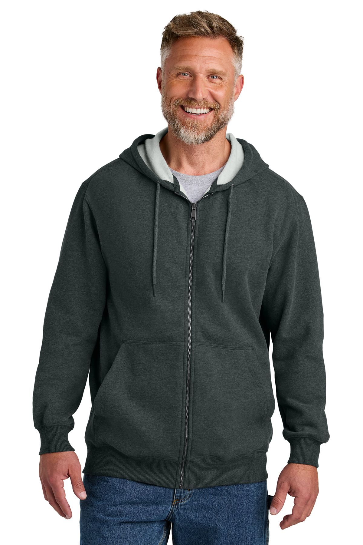 Man wearing a dark gray zip-up hooded sweatshirt, smiling.