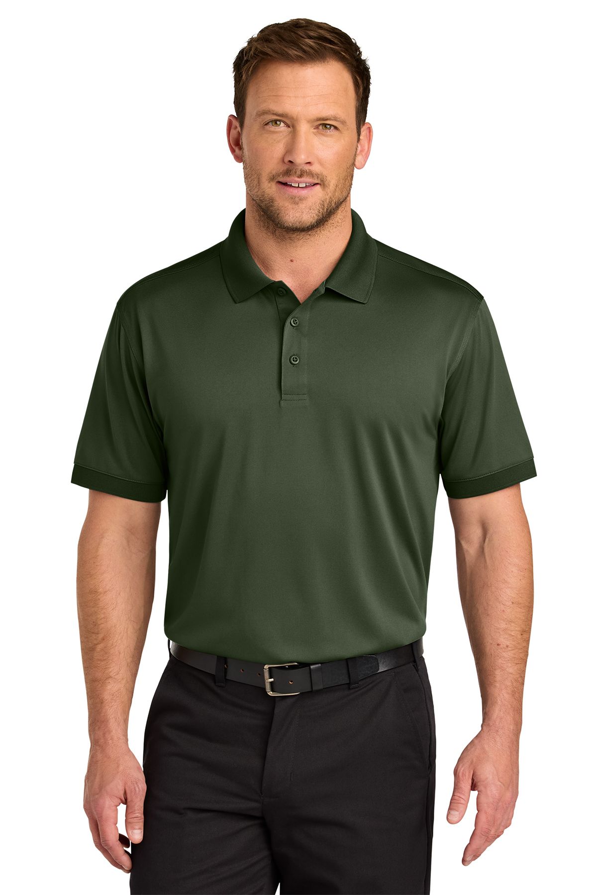 Man wearing a dark green polo shirt and black pants, smiling.