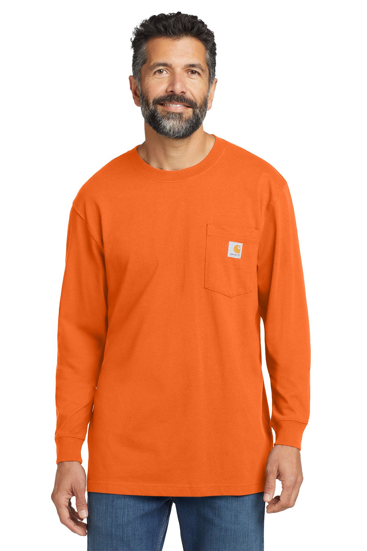 Man wearing an orange long-sleeved shirt with a pocket. He's standing in front of a white background.