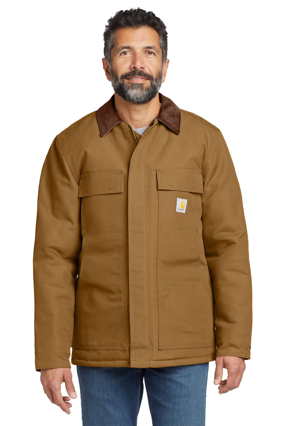 Man in a brown Carhartt jacket, standing outdoors, looking forward.
