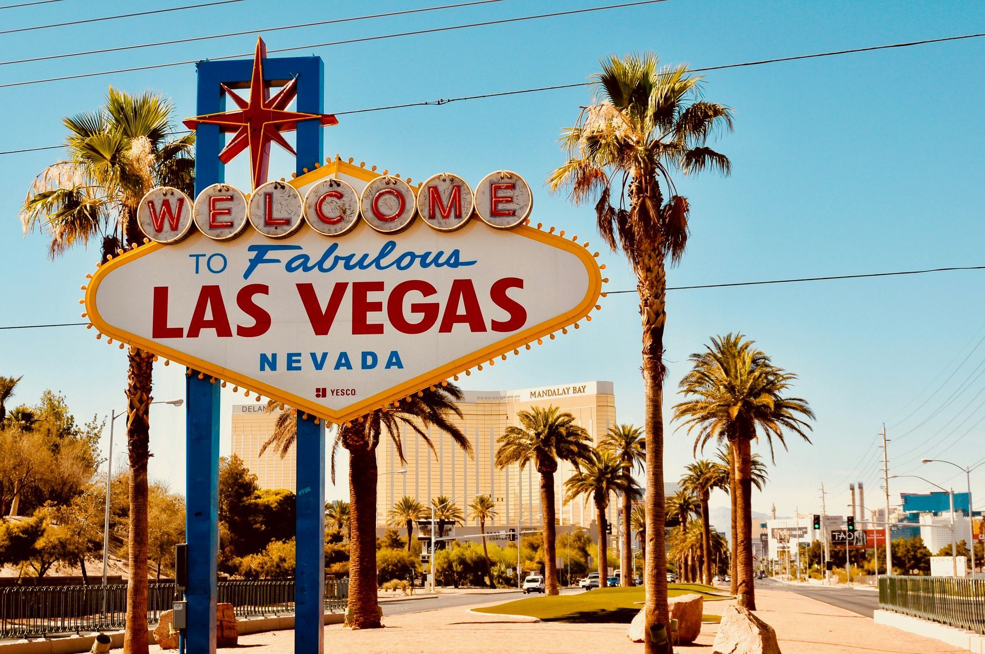 A welcome to fabulous Las Vegas sign with palm trees in the background