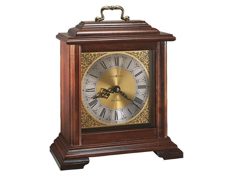 A wooden clock with roman numerals on the face