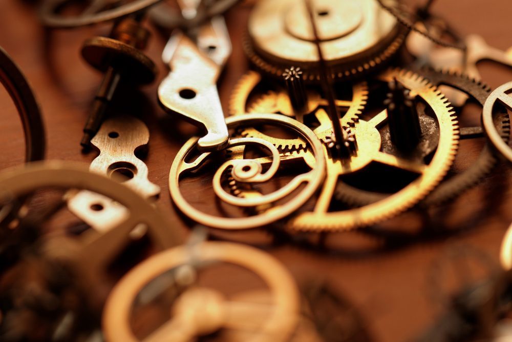 Mechanical vs. Battery Which Clock Type Is Right for You - Detail of clock parts for restoration