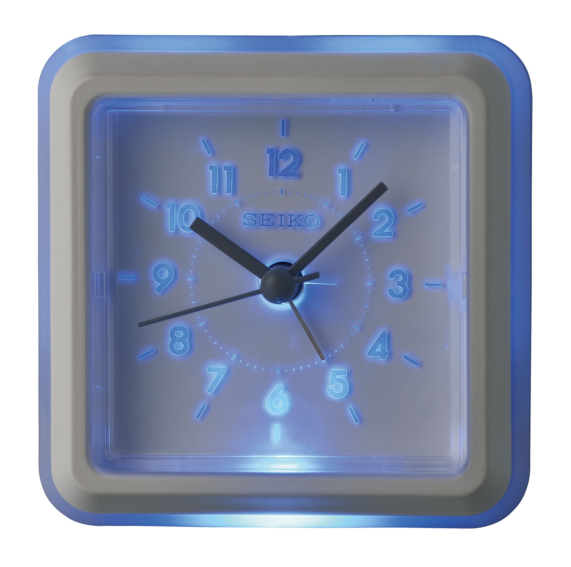 A seiko clock with a blue light behind it
