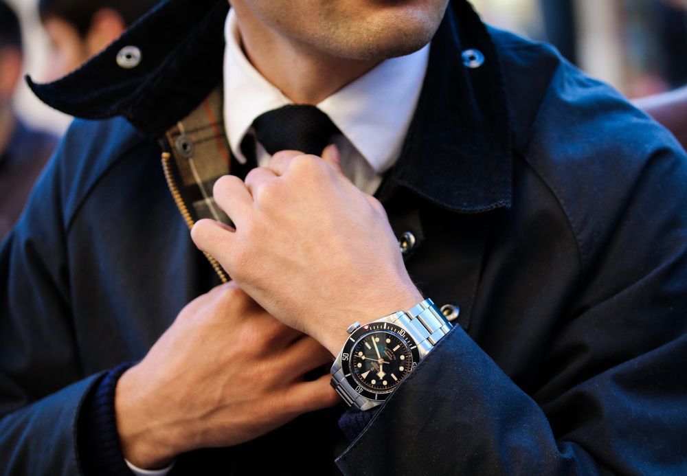 Man wearing a Pre-Owned Watch