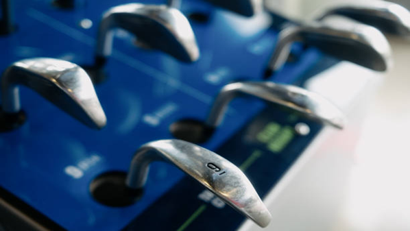 Coach Jonathan Smith and the State Champion Marjory Stoneman Douglas High School Girls Varsity Golf Team A group of young women standing next to each other holding a trophy.