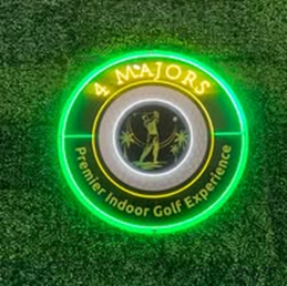A neon sign for 4 majors premier indoor golf experience