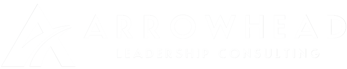 The logo for arrowhead leadership consulting is black and gold.