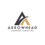 The logo for arrowhead leadership consulting is black and gold.