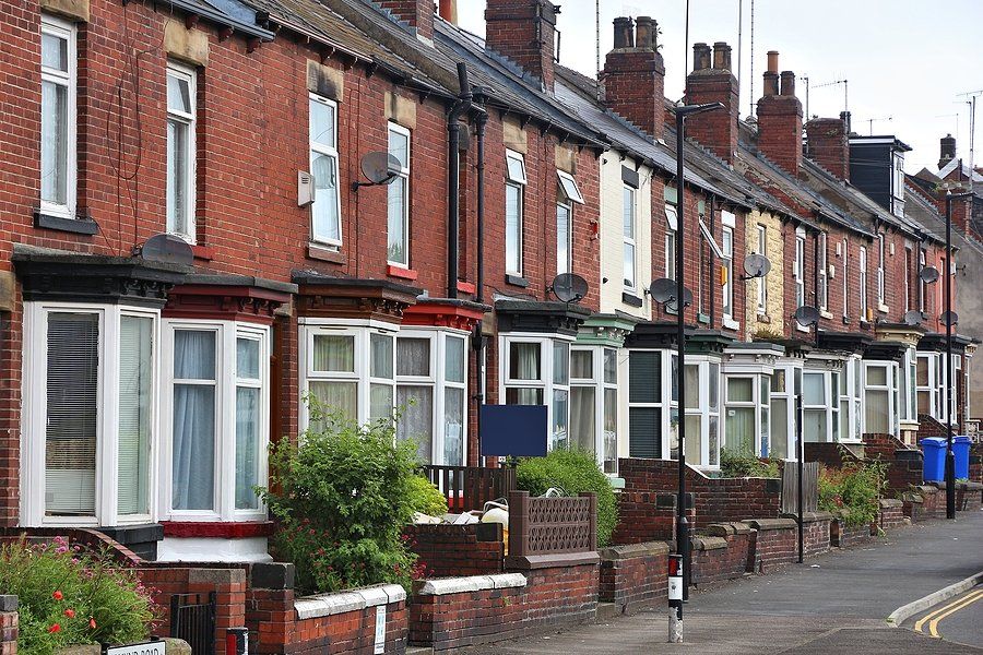 big houses with brick walls