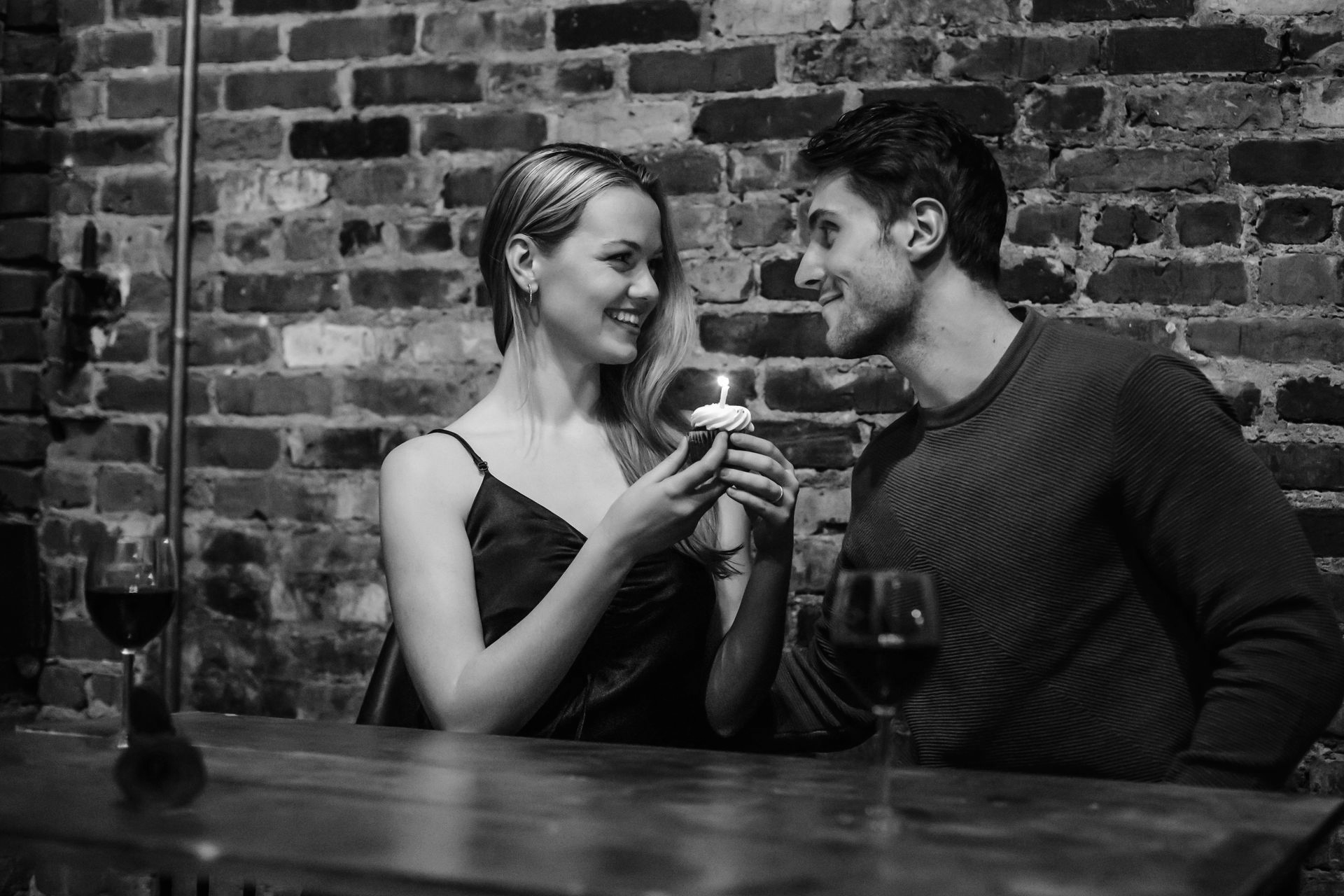 Couple having a drink after arranging a GFE in Manchester with LTS.