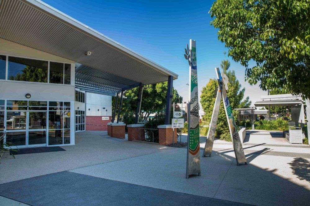 Modern Building Entrance With Sculptures — Delicious Entertainment In Emerald, QLD