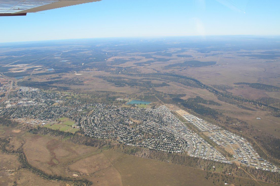 Aerial View of a Town Surrounded — Delicious Entertainment In Moranbah, QLD