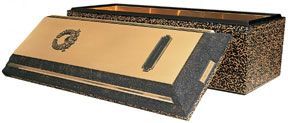 A black and gold box with the lid open on a white background.