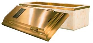 A brass coffin with the lid open on a white background.