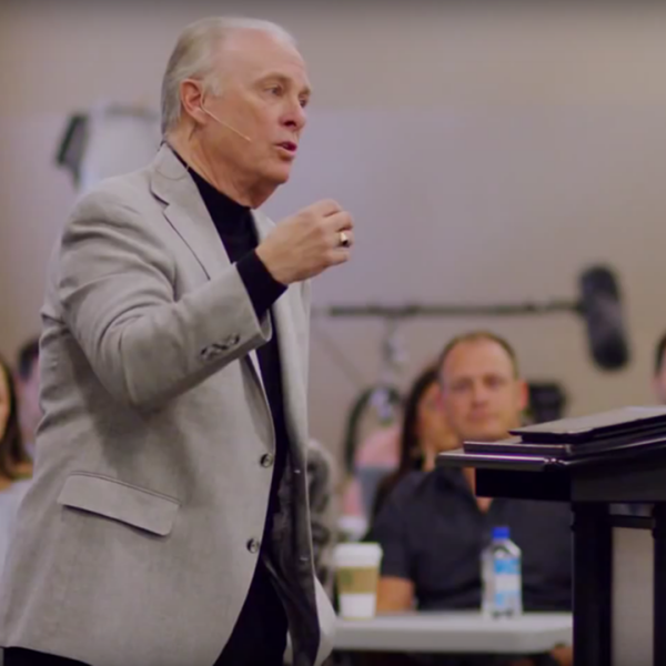 Dr. Mark Rutland speaking at a NICL event