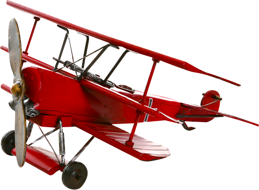 Red biplane model with propeller and wheels.