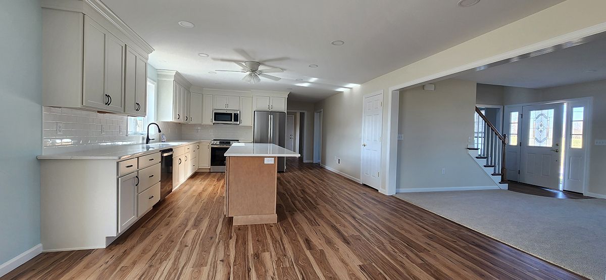 kitchen with island and ceiling fan