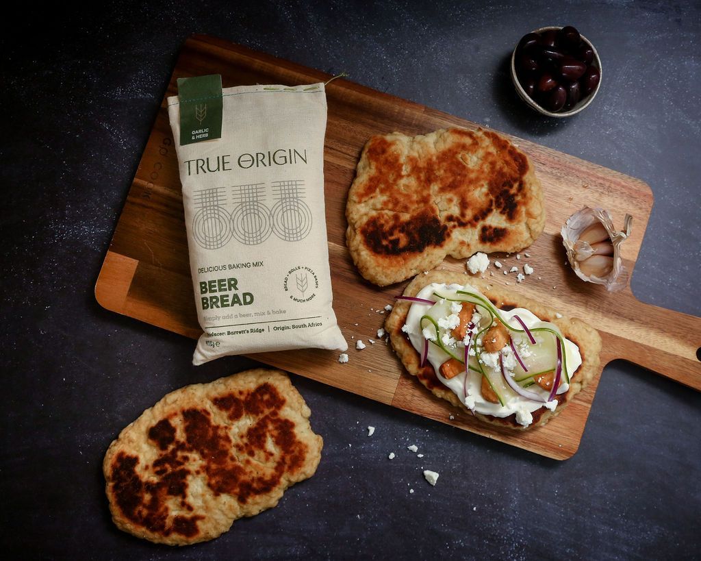 Photos of some flatbreads made with Beer Bread mixed with yoghurt instead of beer and a variety of toppings