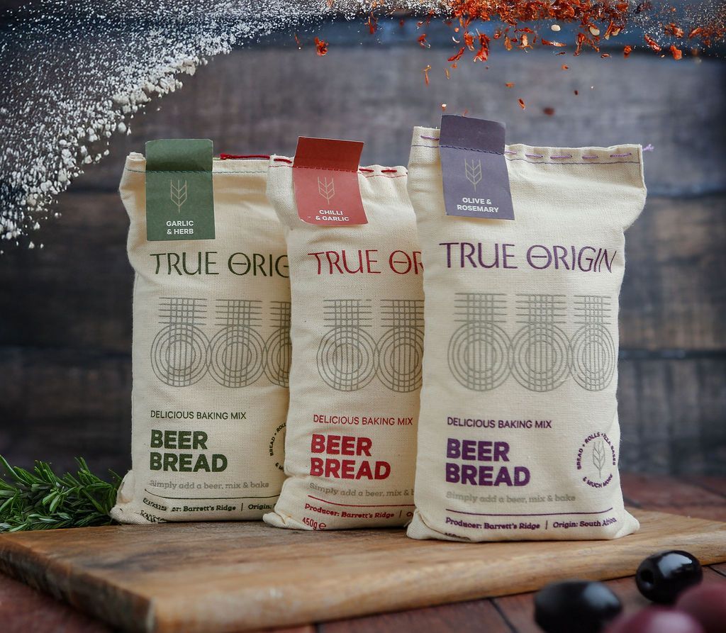 An image of the three flavours of Beer Bread - Garlic & Herb, Chilli & Garlic, Olive & Rosemary