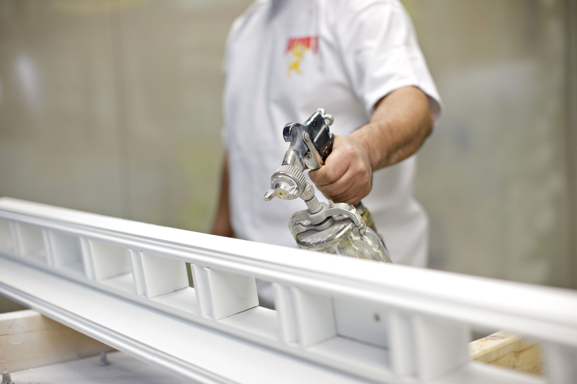 Training facility paint sprayer