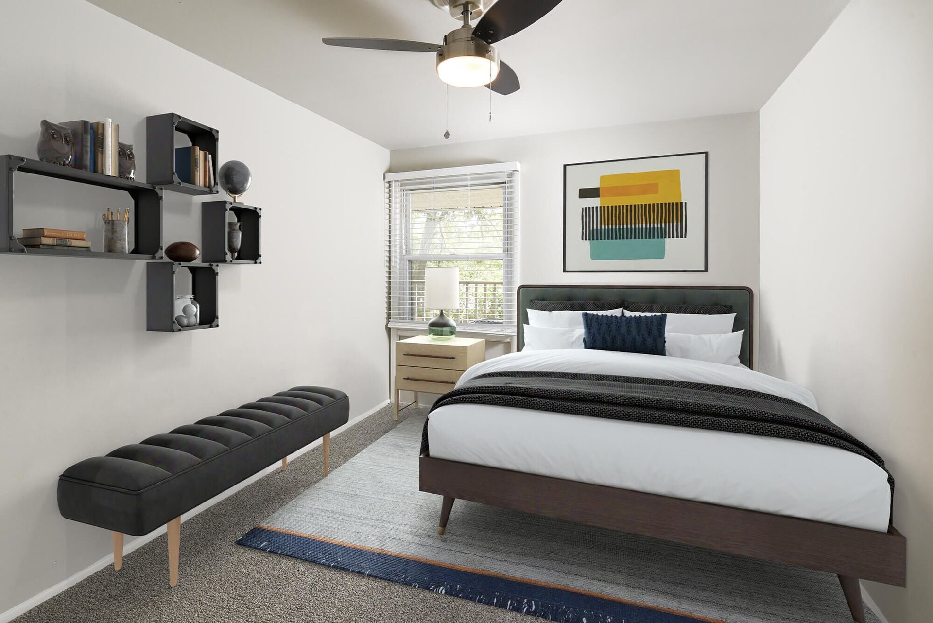 Bedroom in an apartment with a queen bed, nightstand, window, wall art, and floating shelves.
