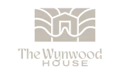 A logo for gunn 's store , a traditional good family shopping store.