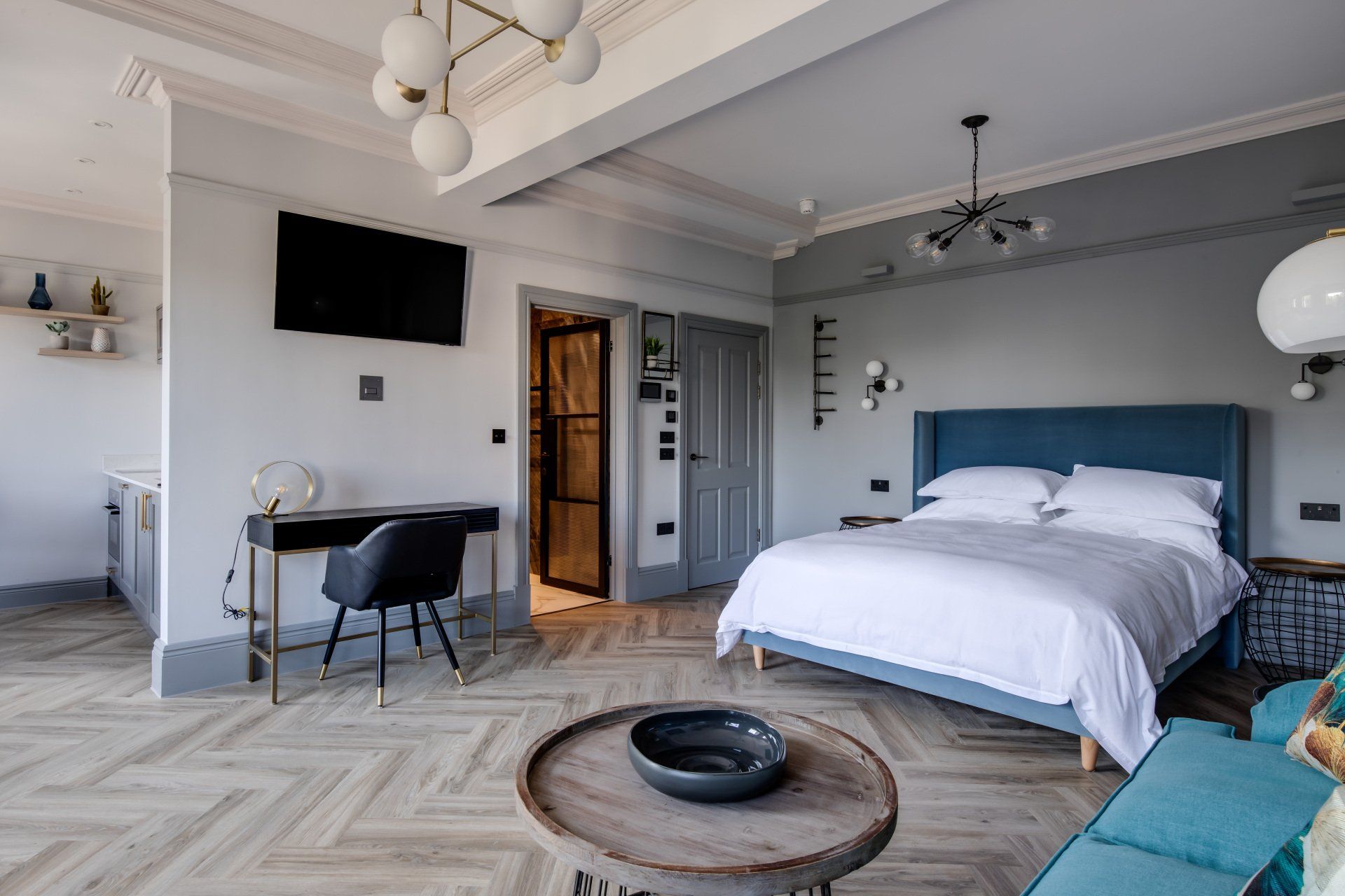 There is a large bed in the middle of the room.