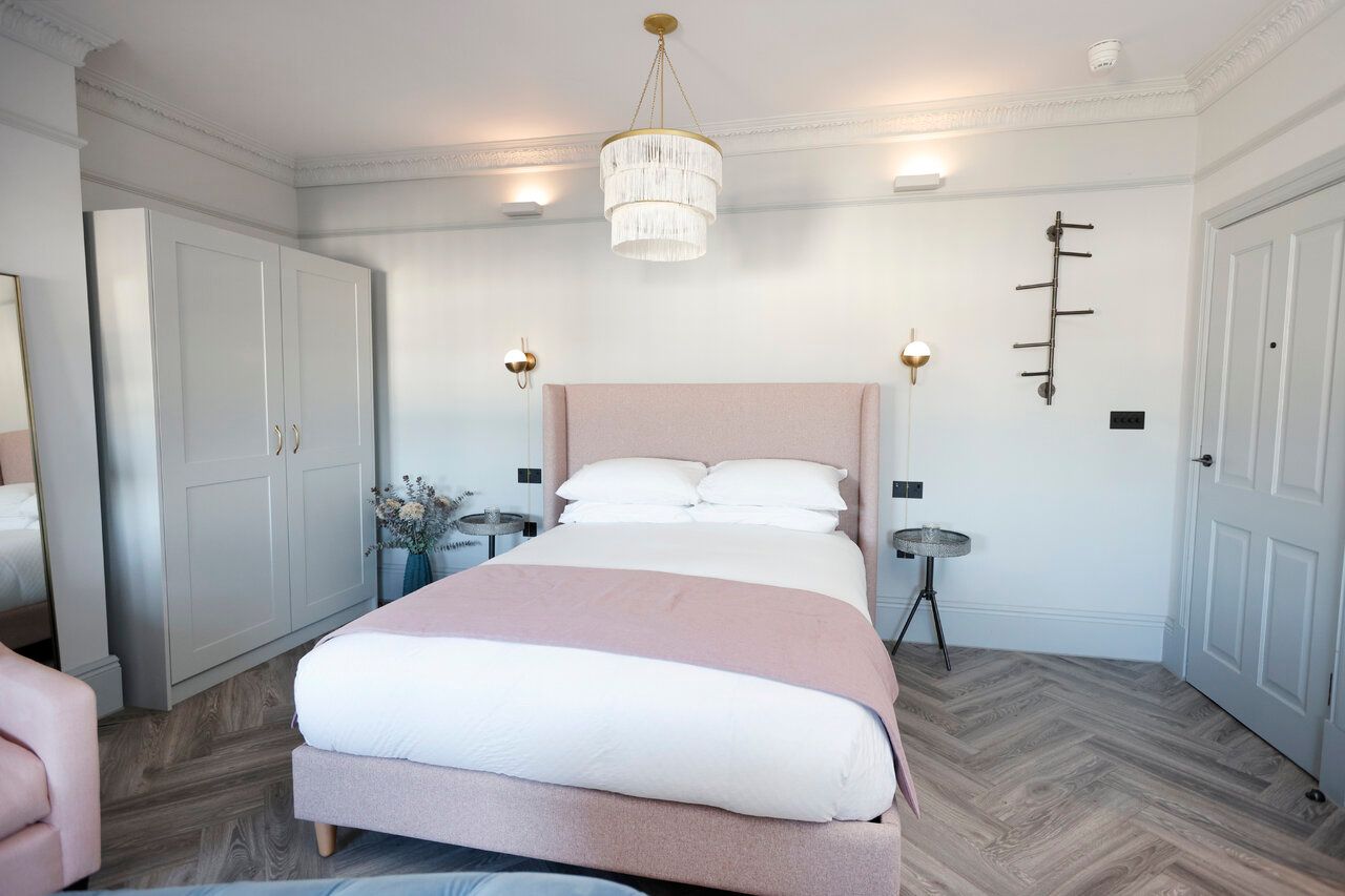 There is a bed in the middle of the room.