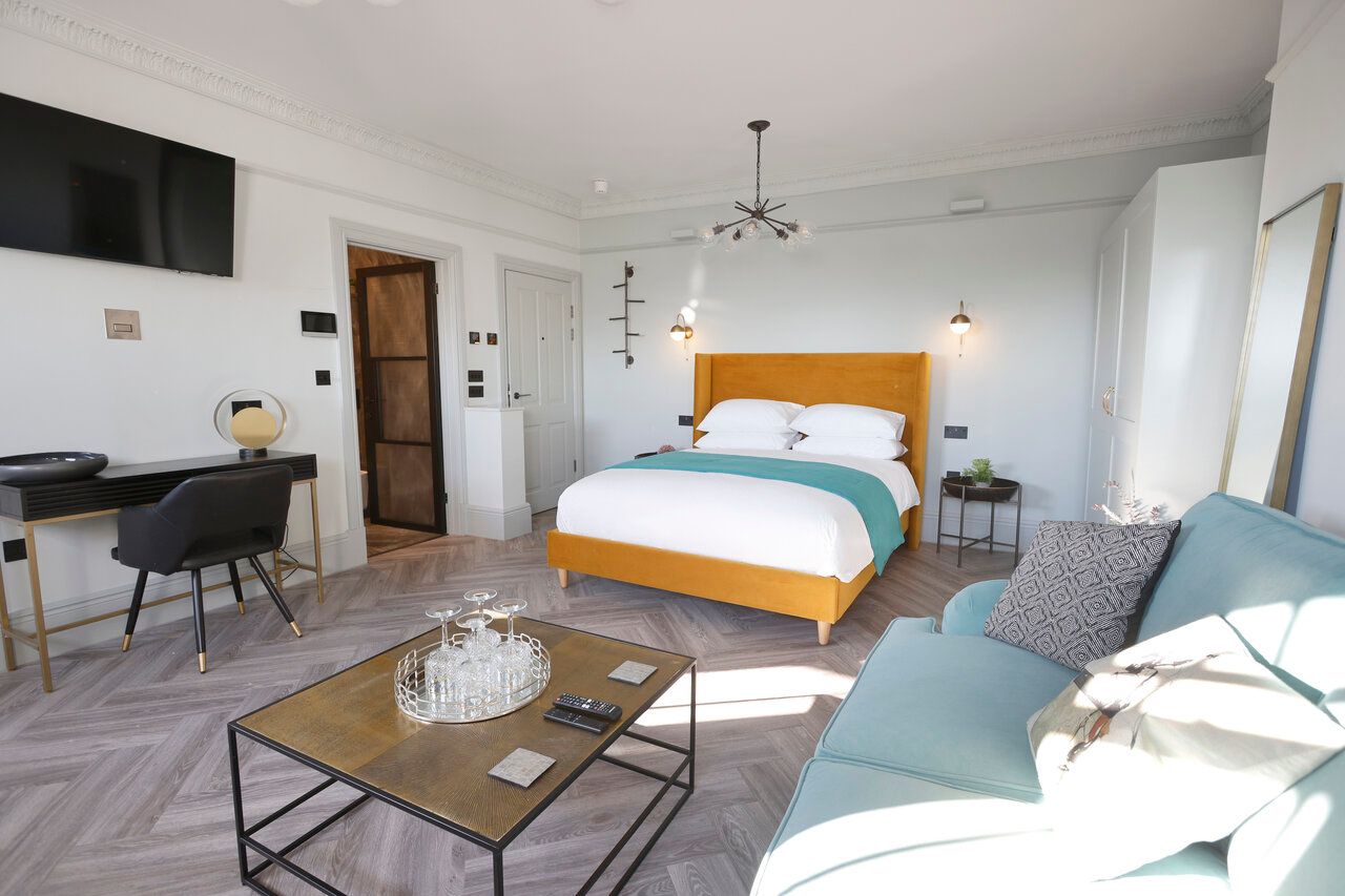 There is a large bed in the middle of the room.