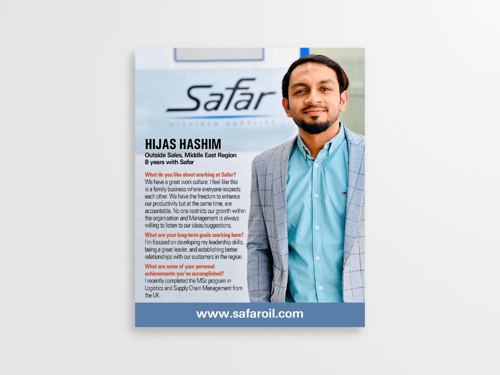 A man in a suit and blue shirt is on the cover of a magazine.