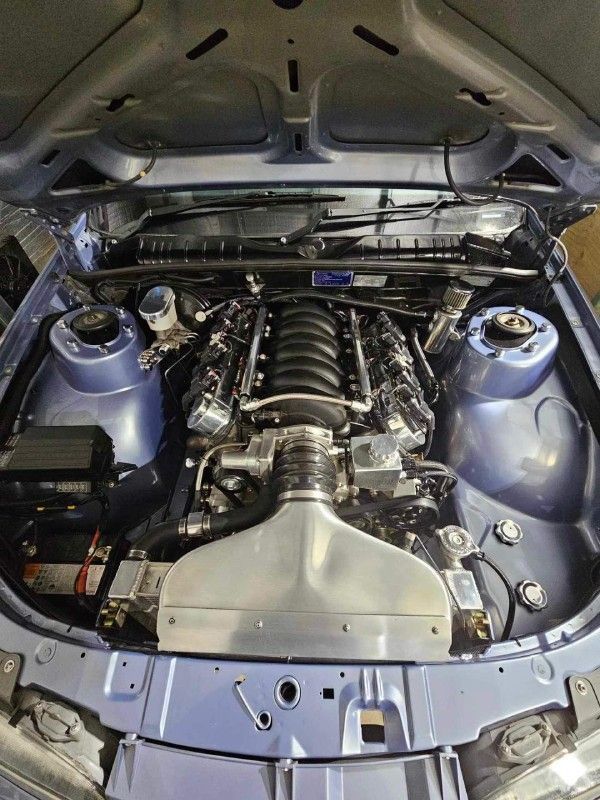 A Close Up Of A Engine On A Cart In A Garage — Hervey Bay Service Centre in Pialba, QLD