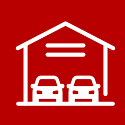A white icon of a garage with two cars parked inside of it on a red background.