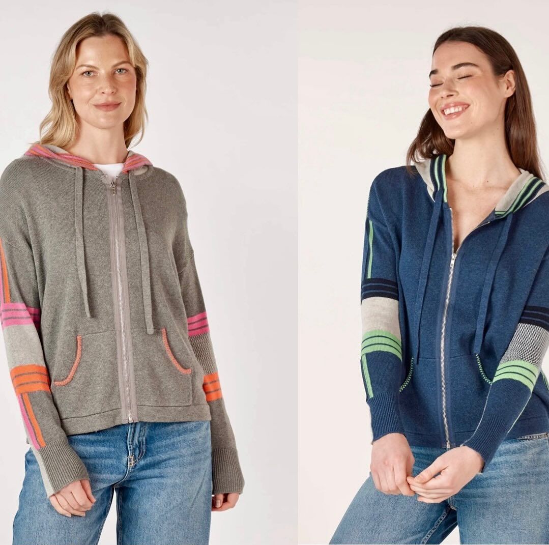 Two Women Wearing Hoodies Are Standing Next to Each Other — Onyx Poppy Boutique Buderim in Sunshine Coast, QLD