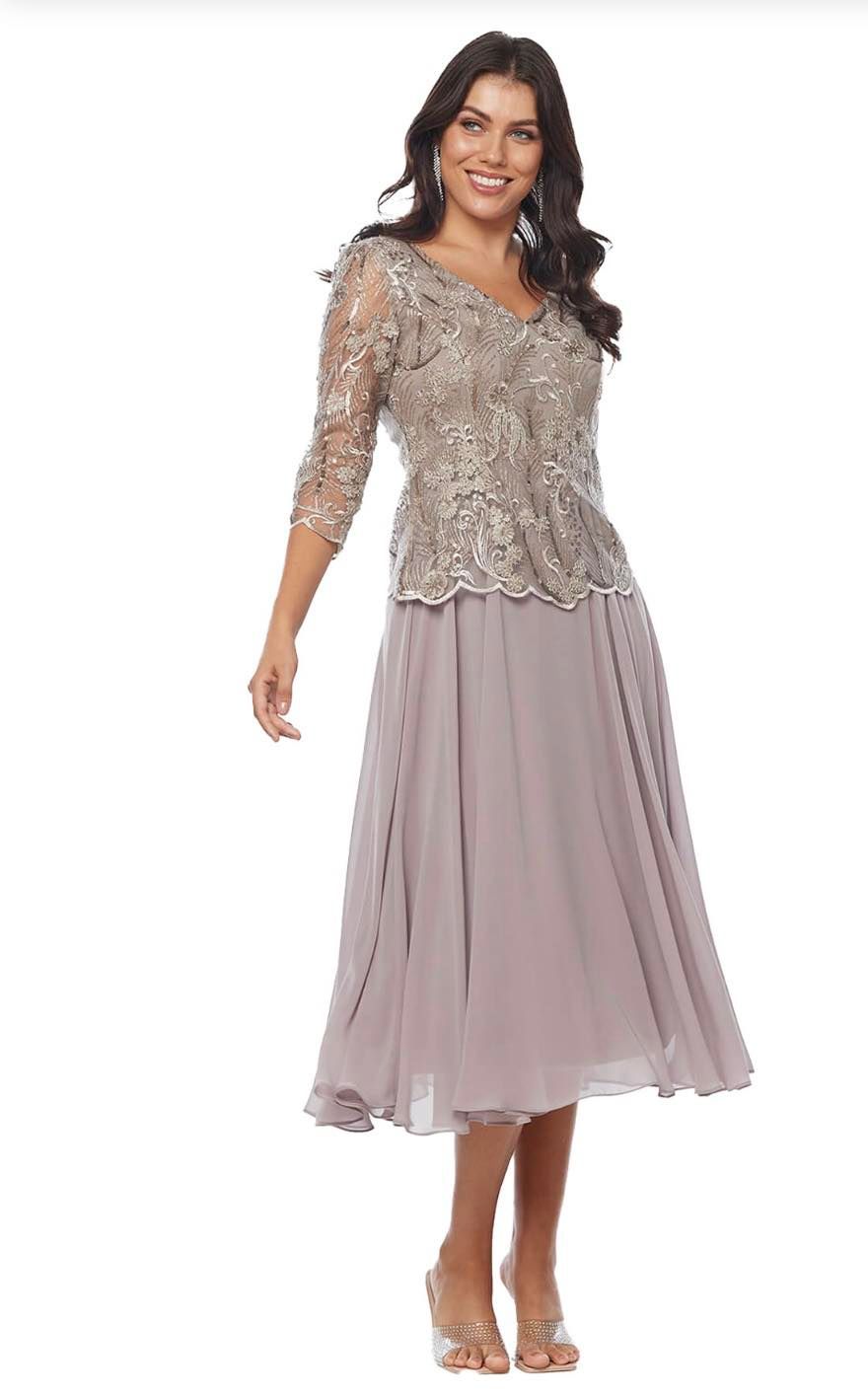 A Woman is Wearing a Mother of the Bride Dress With a Jacket — Onyx Poppy Boutique in Buderim, QLD